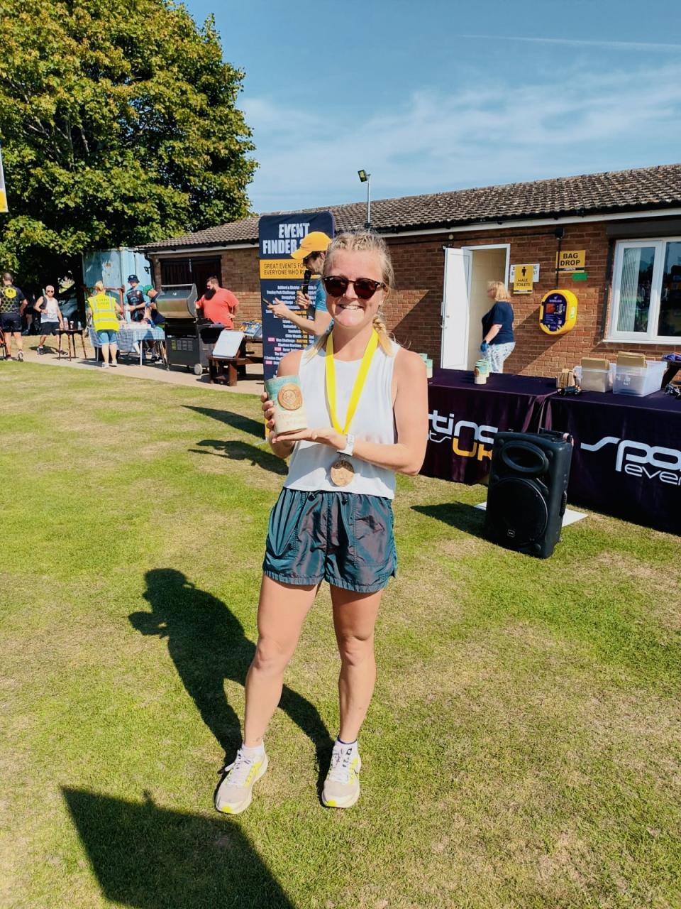 Emily Hale now eats healthily and enjoys running, pictured after winning a 5km race in Kent. (Supplied)