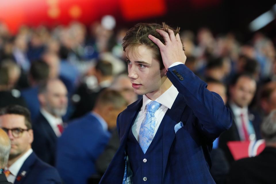 Beckett Sennecke reacts to being selected with the third overall pick by the Anaheim Ducks.
