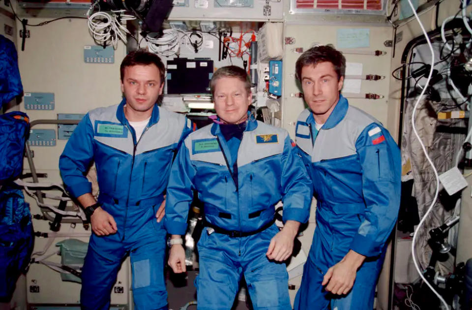 ISS inaugural crew of Yuri P. Gidzenko (left) William M. Shepherd (center), and Sergei K. Krikalev.