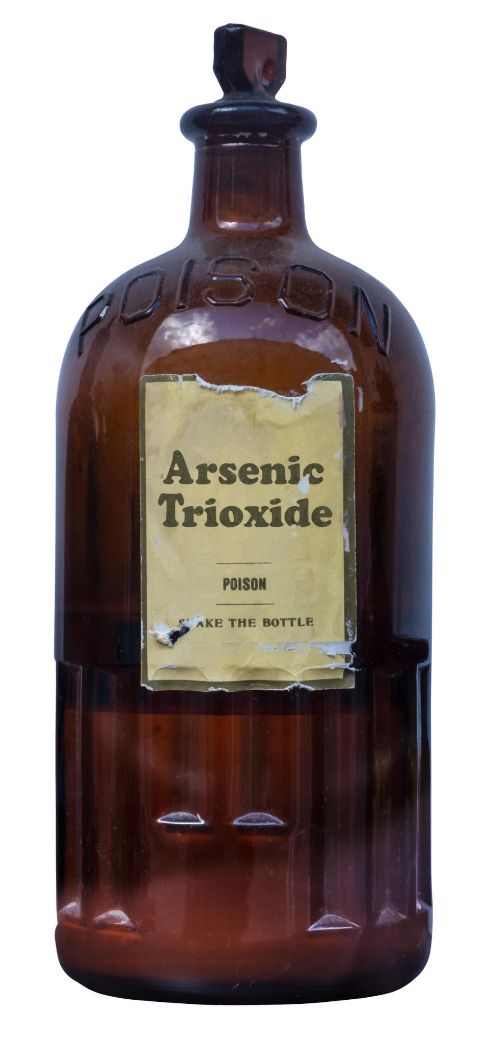 A brown bottle labeled "Arsenic Trioxide" with "Poison" below it and a note to "Shake the Bottle." The bottle is vintage and has a cork stopper