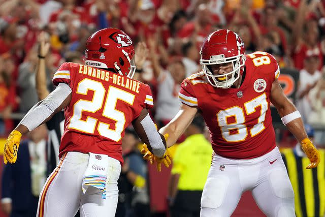 <p>Jason Hanna/Getty</p> Clyde Edwards-Helaire and Travis Kelce in October 2022