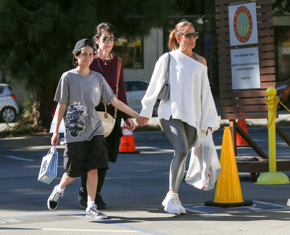 jennifer lopez wearing white sweatshirt, grey leggings and white chunky sneakers, Emme Maribel Muniz and Jennifer Lopez are seen on October 15, 2023 in Los Angeles, California. (Photo by thecelebrityfinder/Bauer-Griffin/GC Images)