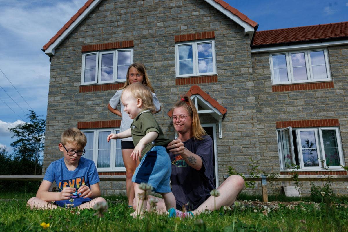 Michelle Jaques and her four children said they "could not be happier" with their Somerton home. <i>(Image: Live West)</i>