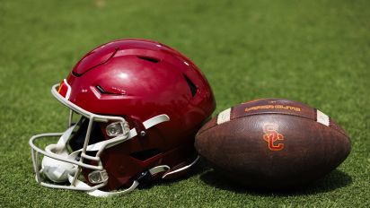 Getty Images - LOS ANGELES, CALIFORNIA - APRIL 20: A detail view of a USC Trojans helmet and football during the spring football game at United Airlines Field at the Los Angeles Memorial Coliseum on April 20, 2024 in Los Angeles, California. (Photo by Ric Tapia/Getty Images)