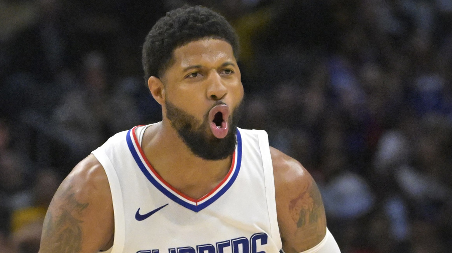 Reuters - Apr 7, 2024; Los Angeles, California, USA; Los Angeles Clippers forward Paul George (13) celebrates after a three point basket in the fourth quarter against the Cleveland Cavaliers at Crypto.com Arena. Mandatory Credit: Jayne Kamin-Oncea-USA TODAY Sports