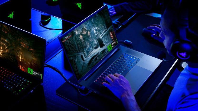 A person playing a game on a Razer Blade 18 laptop.