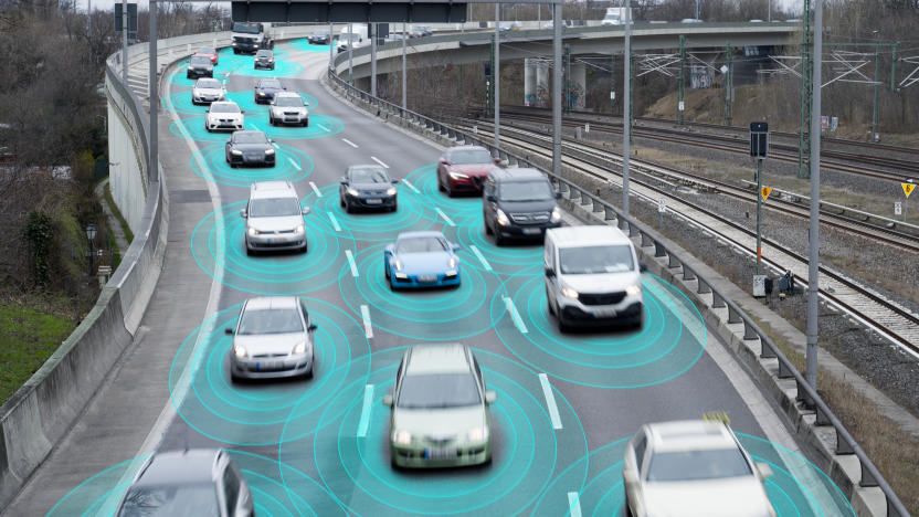Photo illustration of autonomous self-driving cars using artificial intelligence to drive on a highway. They are connected through a network.