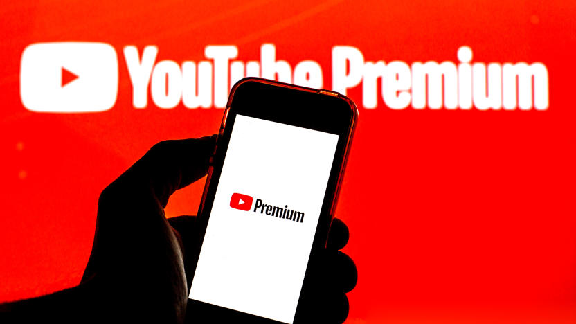 BARCELONA, CATALONIA, SPAIN - 2021/07/26: In this photo illustration a YouTube Premium logo seen displayed on a smartphone and in the background. (Photo Illustration by Thiago Prudêncio/SOPA Images/LightRocket via Getty Images)