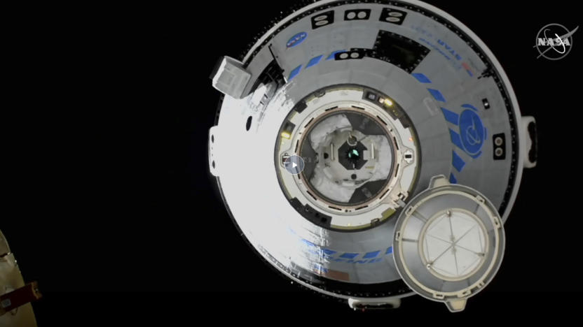 This image from NASA TV shows the Boeing Starliner approaching the International Space Station, Friday, May 20, 2022. Boeing's astronaut capsule has arrived at the International Space Station in a critical repeat test flight. Only a test dummy was aboard the capsule for Friday's docking, a huge achievement for Boeing after years of false starts. (NASA via AP)