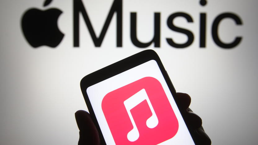 UKRAINE - 2021/04/18: In this photo illustration, Apple Music app seen displayed on a smartphone in front of Apple logo. (Photo Illustration by Pavlo Gonchar/SOPA Images/LightRocket via Getty Images)