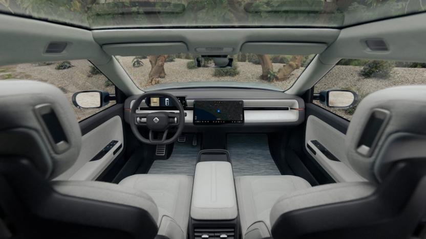 Front seats and dashboard of a Rivian vehicle.