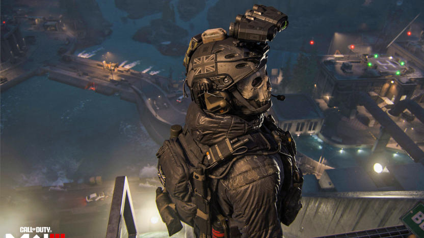 A game character in Call of Duty Modern Warfare III is seen slightly from above as they're completely suited in military gear. Slightly blurred roads and buildings are seen in the lower distance and it appears to be dusk or nighttime. 