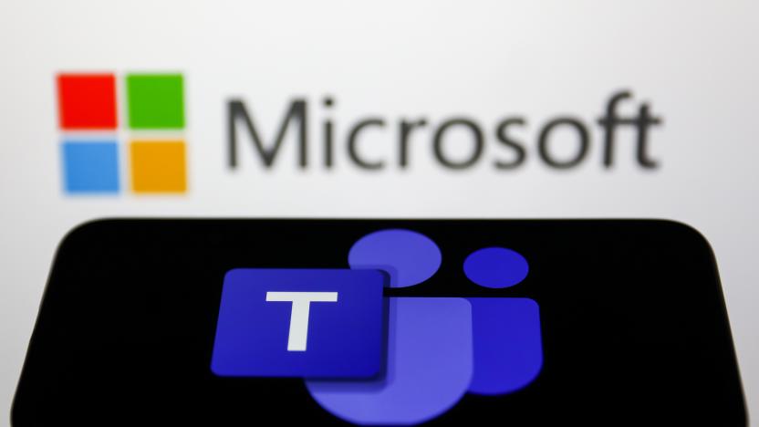 Microsoft Teams logo displayed on a phone screen and Microsoft logo displayed on a screen in the background are seen in this illustration photo taken in Krakow, Poland on May 26, 2022. (Photo Illustration by Jakub Porzycki/NurPhoto via Getty Images)