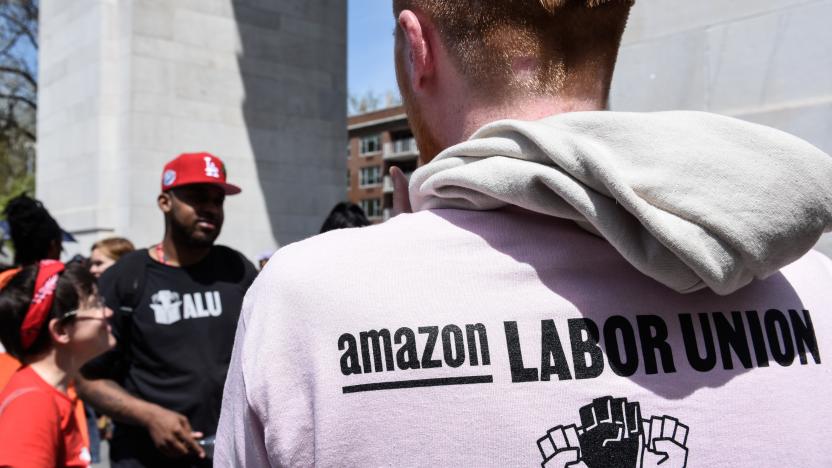 NEW YORK, NY - MAY 01: Amazon workers participate in a May Day rally in Manhattan on May 1, 2022 in New York City. Amazon workers recently unionized a facility in Staten Island called JFK8 emboldening other workers to push for their companies to unionize. (Photo by Stephanie Keith/Getty Images)