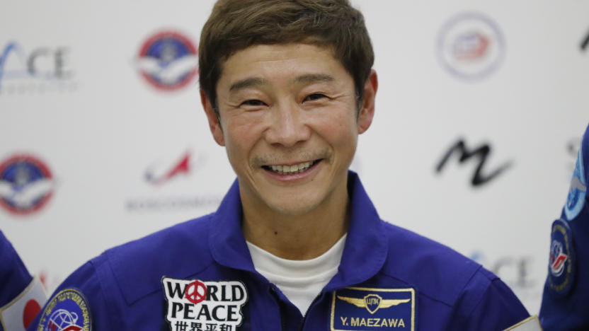 FILE - Space flight participant Yusaku Maezawa attends a news conference ahead of the expedition to the International Space Station at the Gagarin Cosmonauts' Training Center in Star City outside Moscow, Russia, on Oct. 14, 2021. Japanese billionaire Maezawa on Saturday, June 1, 2024, cancelled his planned flight around the moon on a Space X spaceship because of uncertainty about when it may be possible. (Shamil Zhumatov/Pool Photo via AP, File)