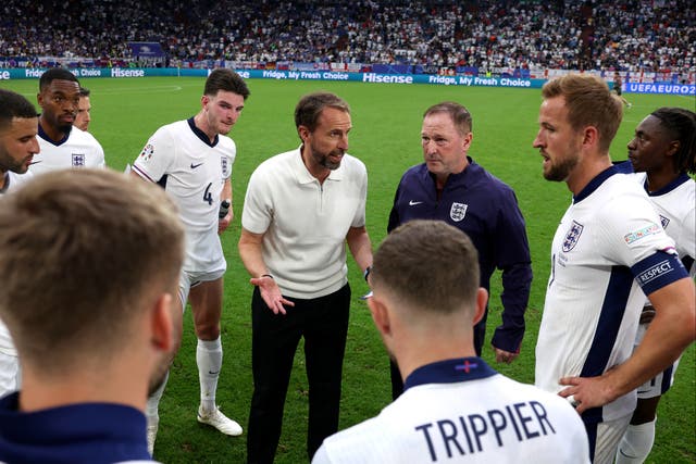 <p>Gareth Southgate (centre) dishing out instructions during extra time of England’s win over Slovakia</p>