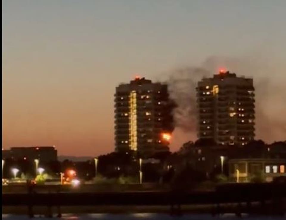 Fire tears through 10th floor flat in east London tower block